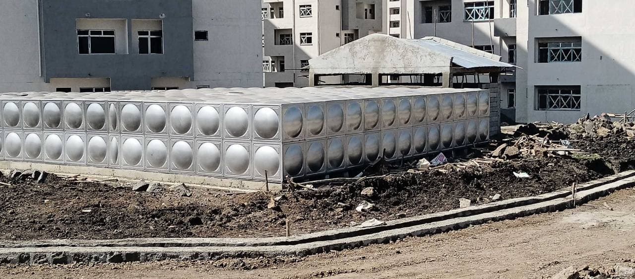 Stainless tank at a construction site